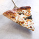 Thin-Crust Whole-Wheat Pizza with Garlic Oil, Three Cheeses, and Basil