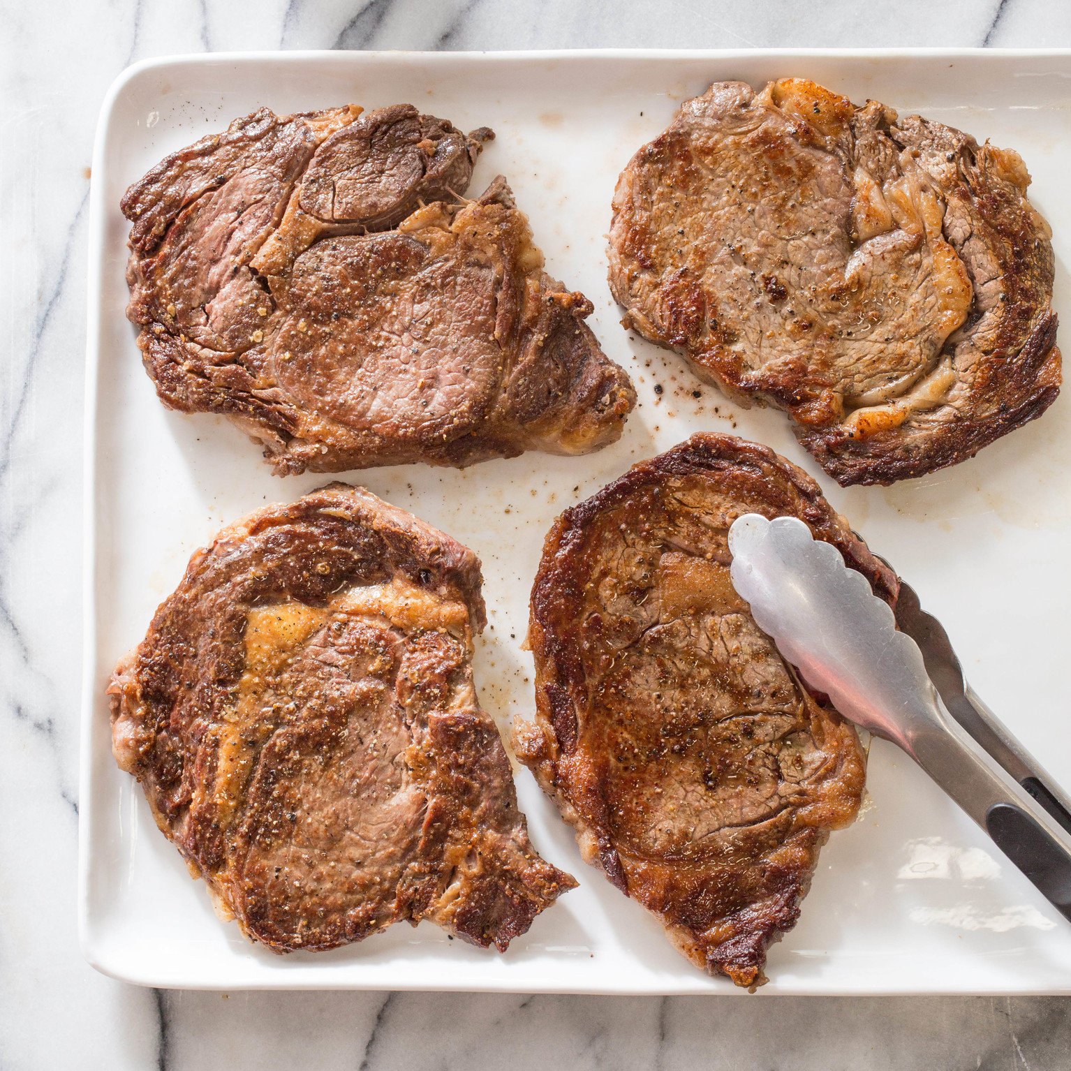 Pan Seared Thick Cut Strip Steaks America S Test Kitchen Pan Seared Thick Cut Strip Steaks America S Test Kitchen